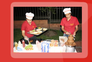 Fuente de chocolate, perros calientes, hamburguesas y bebidas para eventos.