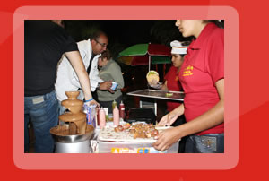 Fuente de chocolate, perros calientes, hamburguesas y bebidas para eventos.